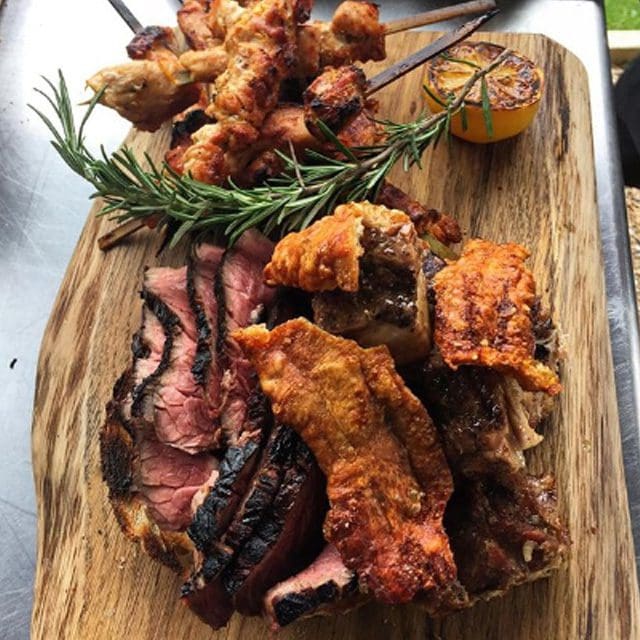 Sussex caterer for weddings & summer parties, catering for your event with joyous platters of tasty barbecued delights, the image shows Barbecued beef rump with chimichurri