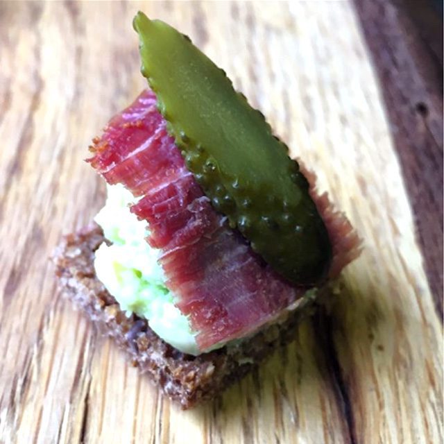 Delicious canapé reception for your wedding or Champagne party. Delectable mini delights to enhance your event, pre-dinner treats to keep the party lively. This image of a petit Pastrami on rye with pimento cheese, pickled chilli & cornichon mouthful shows an example of our irresistible morsels.
