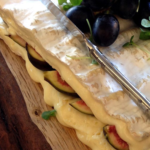 Additional Cheese Board of Sussex or international cheeses with relishes & quince, dates, figs & grapes Port & brandy available too! The image shows ripe brie de meaux with fresh figs