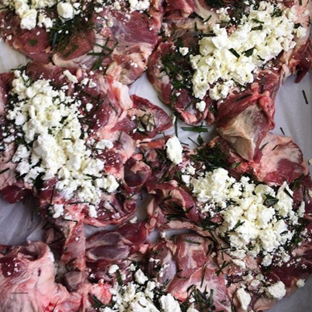 Summer party catering, one of the premier wedding caterers in Sussex the image shows Butterflied leg with garlic & rosemary & a hint of lavender ready to be cooked low & slow