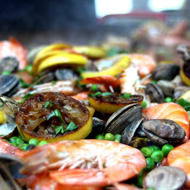 Sussex Wedding caterer provides evening food for weddings, the image shows a stylish fish paella